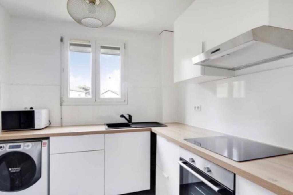 Superbe Appartement Lumineux Et Calme Сент-Уен Екстериор снимка